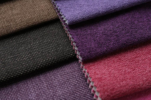 Close-up view of upholstery fabric samples with different textures